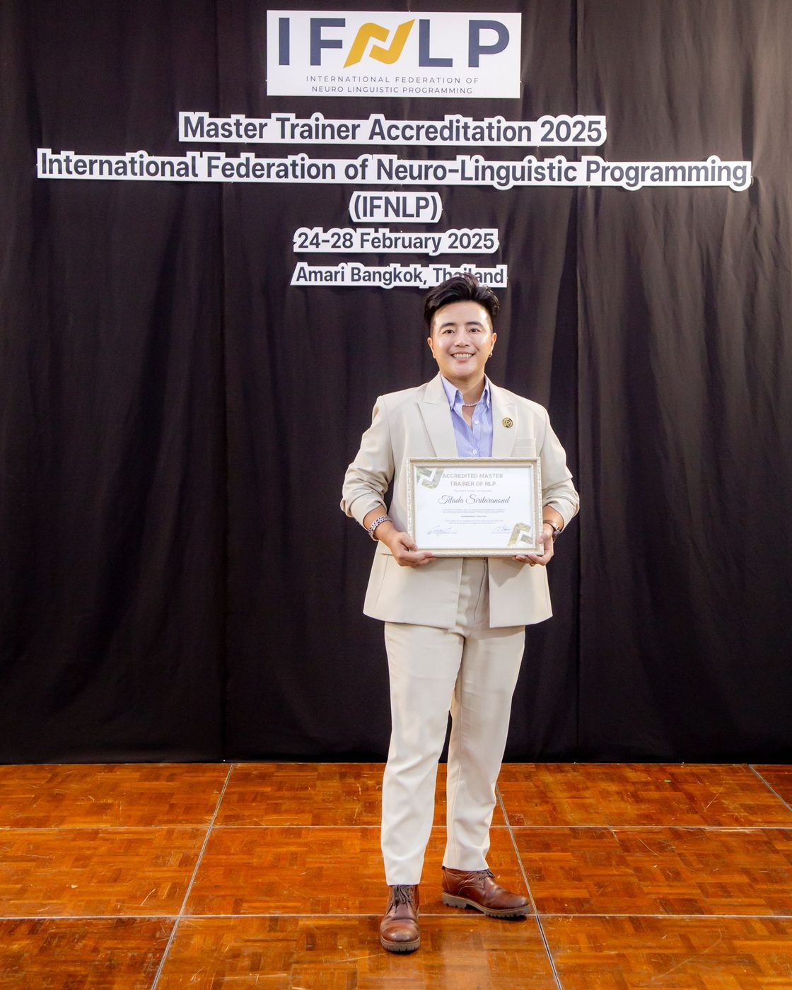 ฟิล์มถือใบรับรอง NLP Master Trainer ปี 2025